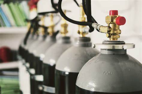 CO2 fire suppression system installed in a library to protect books and archival materials from fire damage.