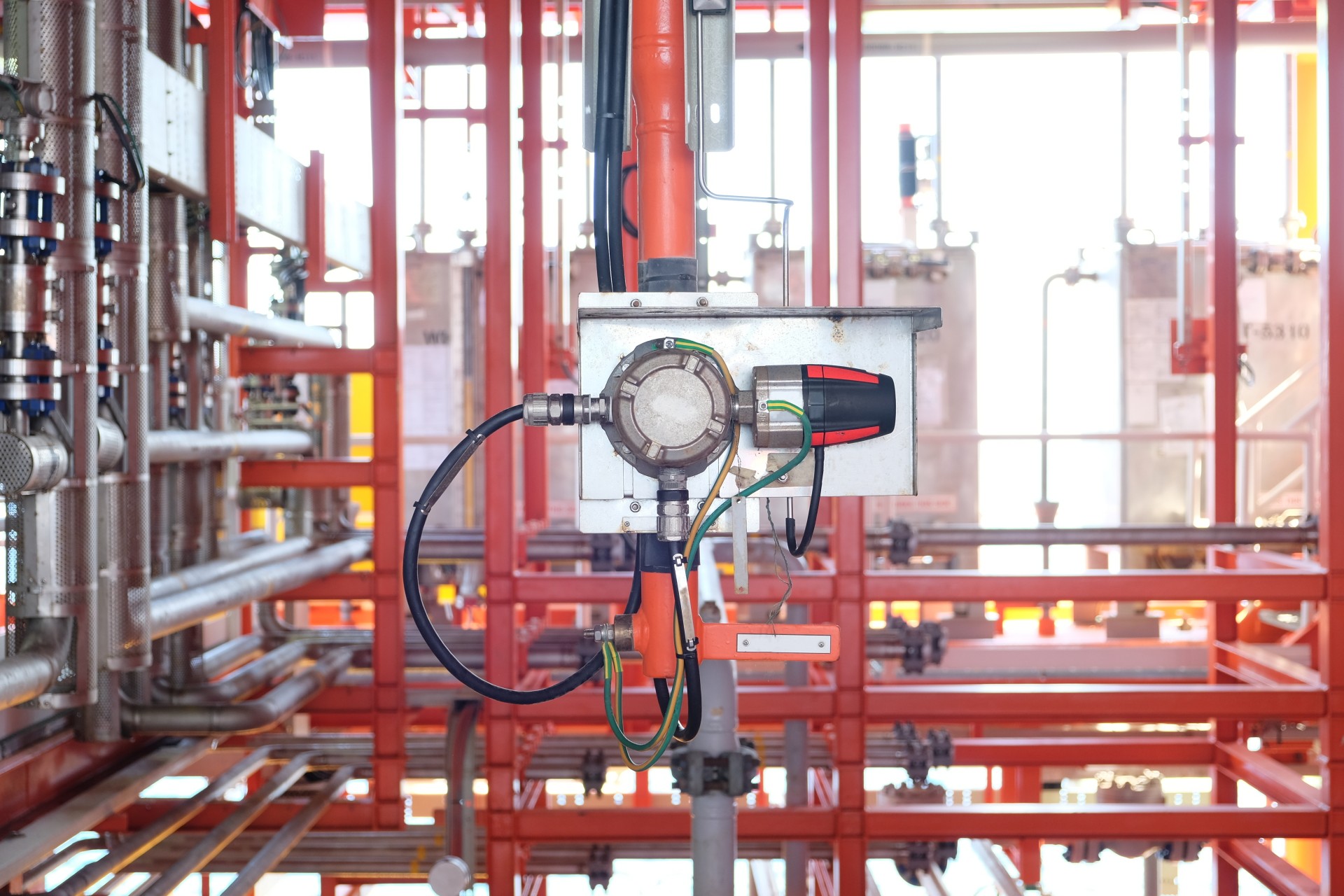 Combustible gas leak detector installed in an industrial factory environment