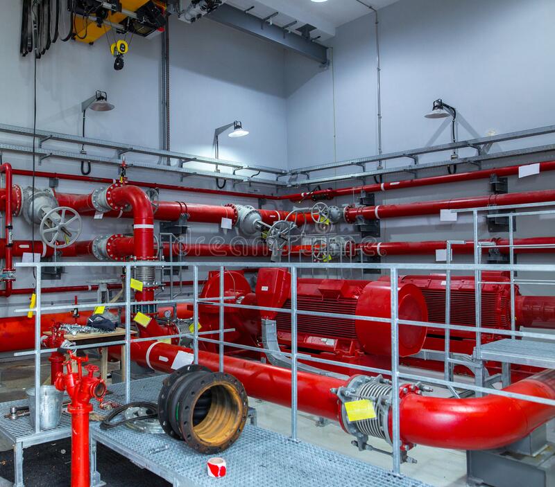 Industrial fire pump station with multiple pumps and piping for high-capacity fire protection systems