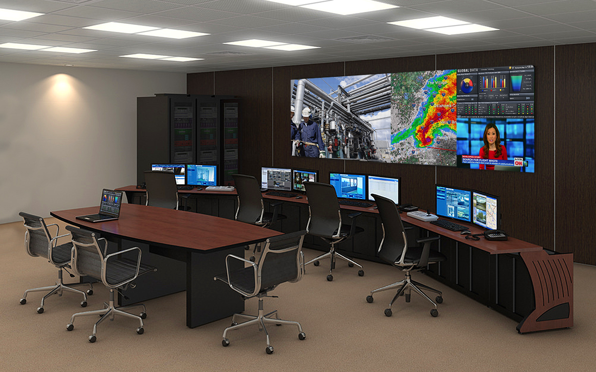 Security control room with multiple surveillance monitors displaying live CCTV footage for 24/7 monitoring.